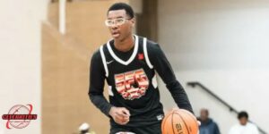 Bryce James playing basketball in a black SFG jersey during a game
