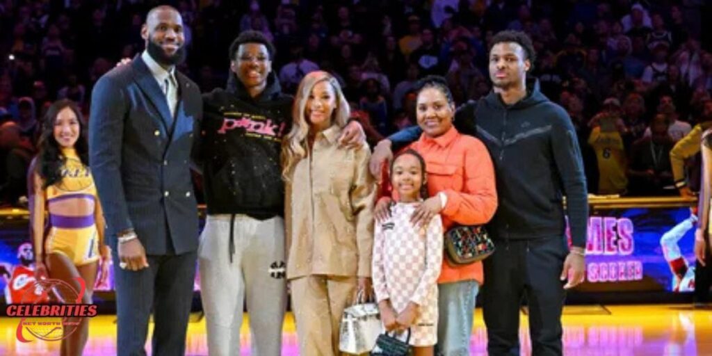 Bryce James with family at a basketball event.